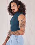 Sleeveless Essential Turtleneck in Lagoon side view on Jesse