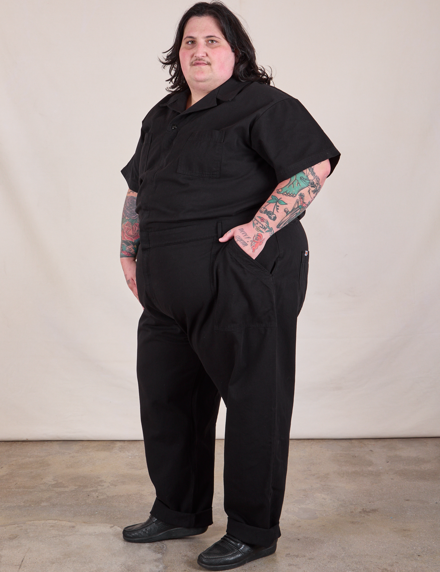 Side view of Long Jumpsuit in Basic Black on Sam