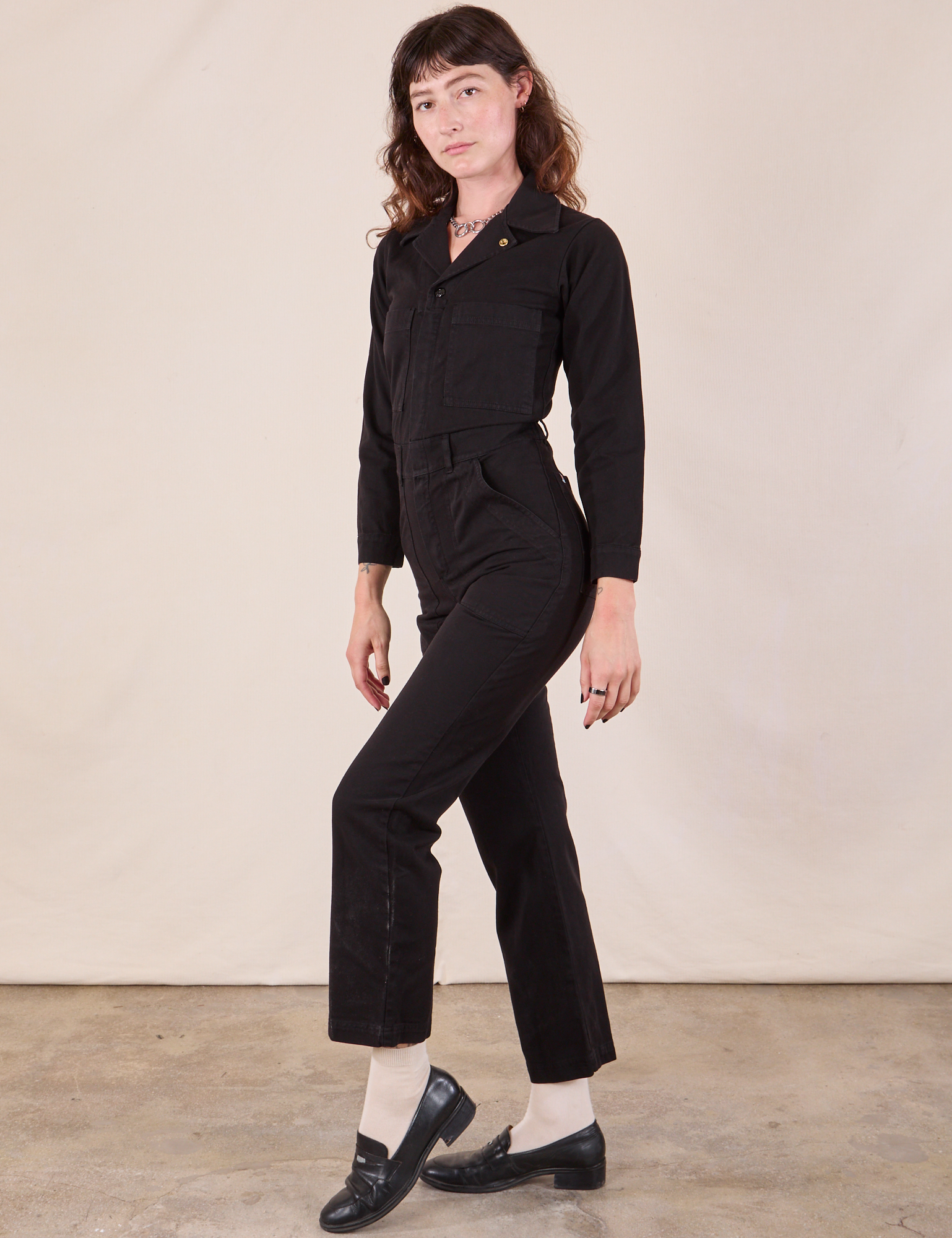 Long Sleeve Jumpsuit in Basic Black side view on Alex