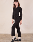 Long Sleeve Jumpsuit in Basic Black side view on Alex