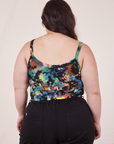 Back view of Cropped Cami in Rainbow Magic Waters and black Petite Black Western Pants worn by Ashley