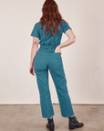 Back view of Short Sleeve Jumpsuit in Marine Blue worn by Alex
