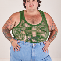 Sam is 5'10" and wearing XL Mesh Tank Top in Lawn Green