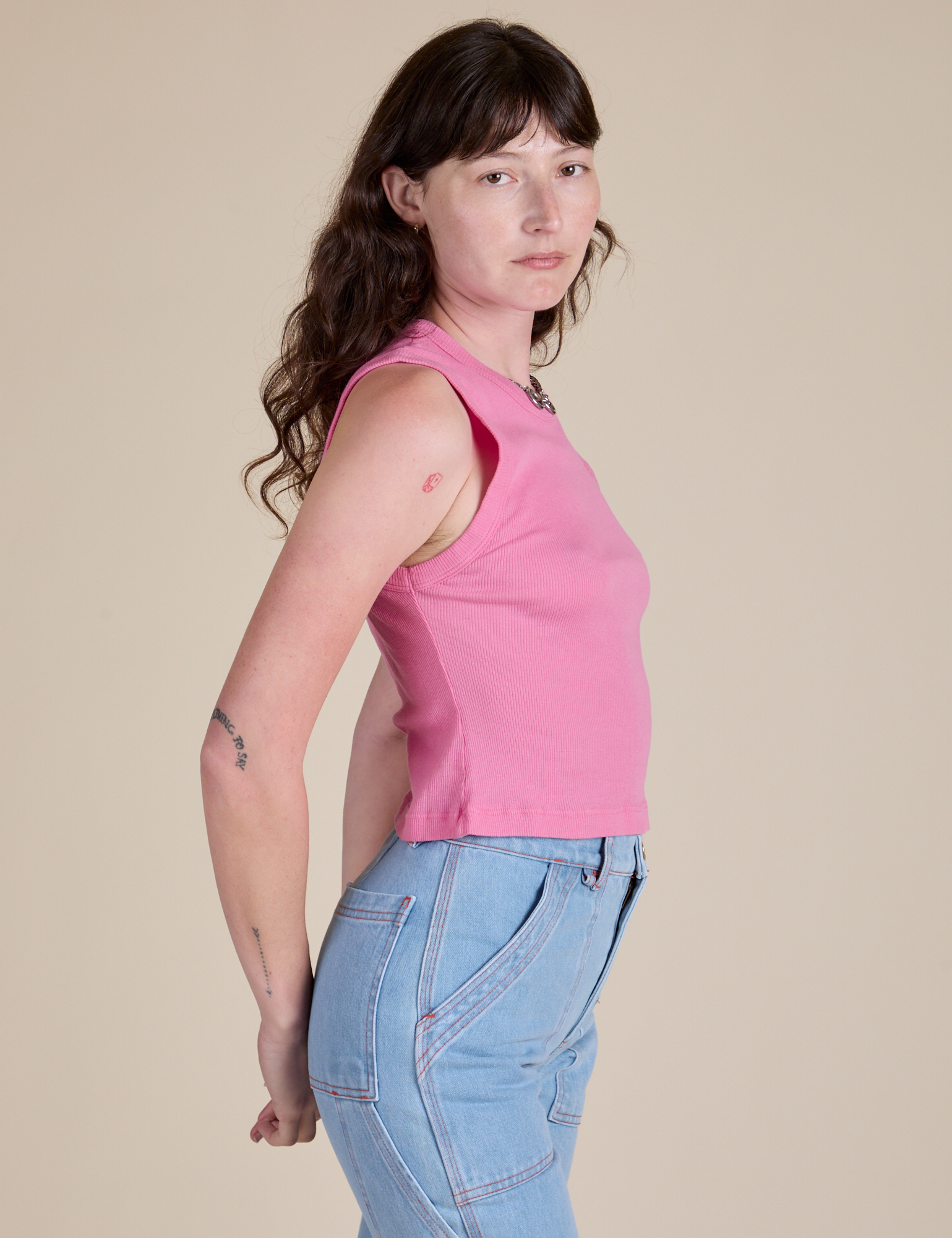 Muscle Tee in Bubblegum Pink side view on Alex