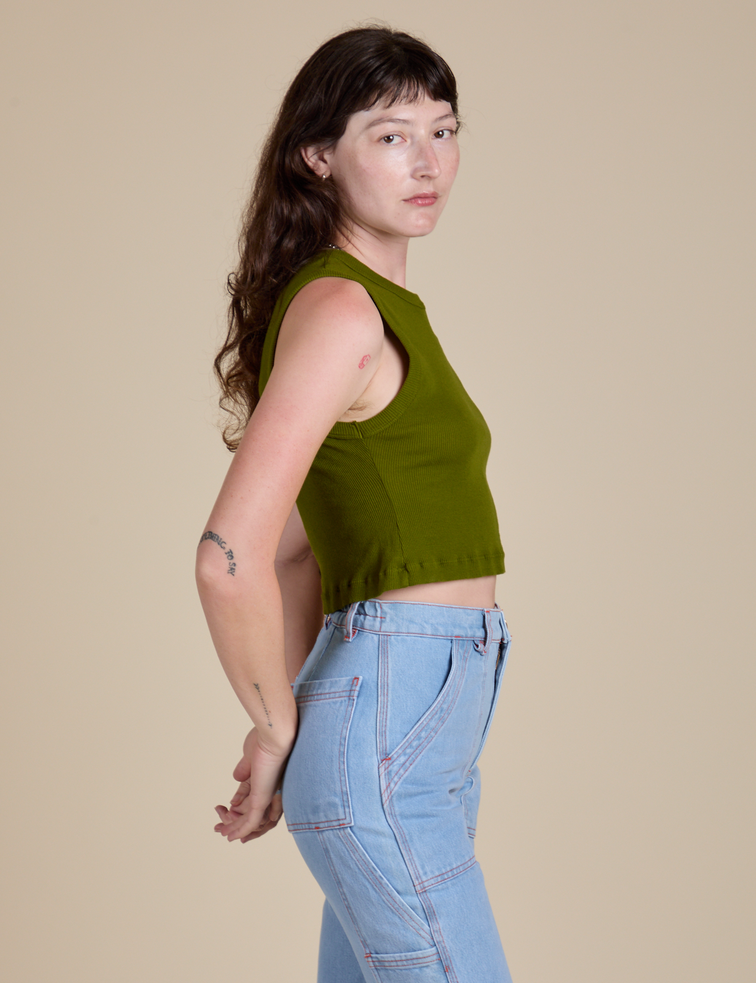 Muscle Tee in Summer Olive side view on Alex