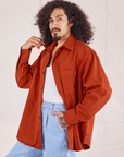 Angled view of Oversize Overshirt in Paprika on Jesse