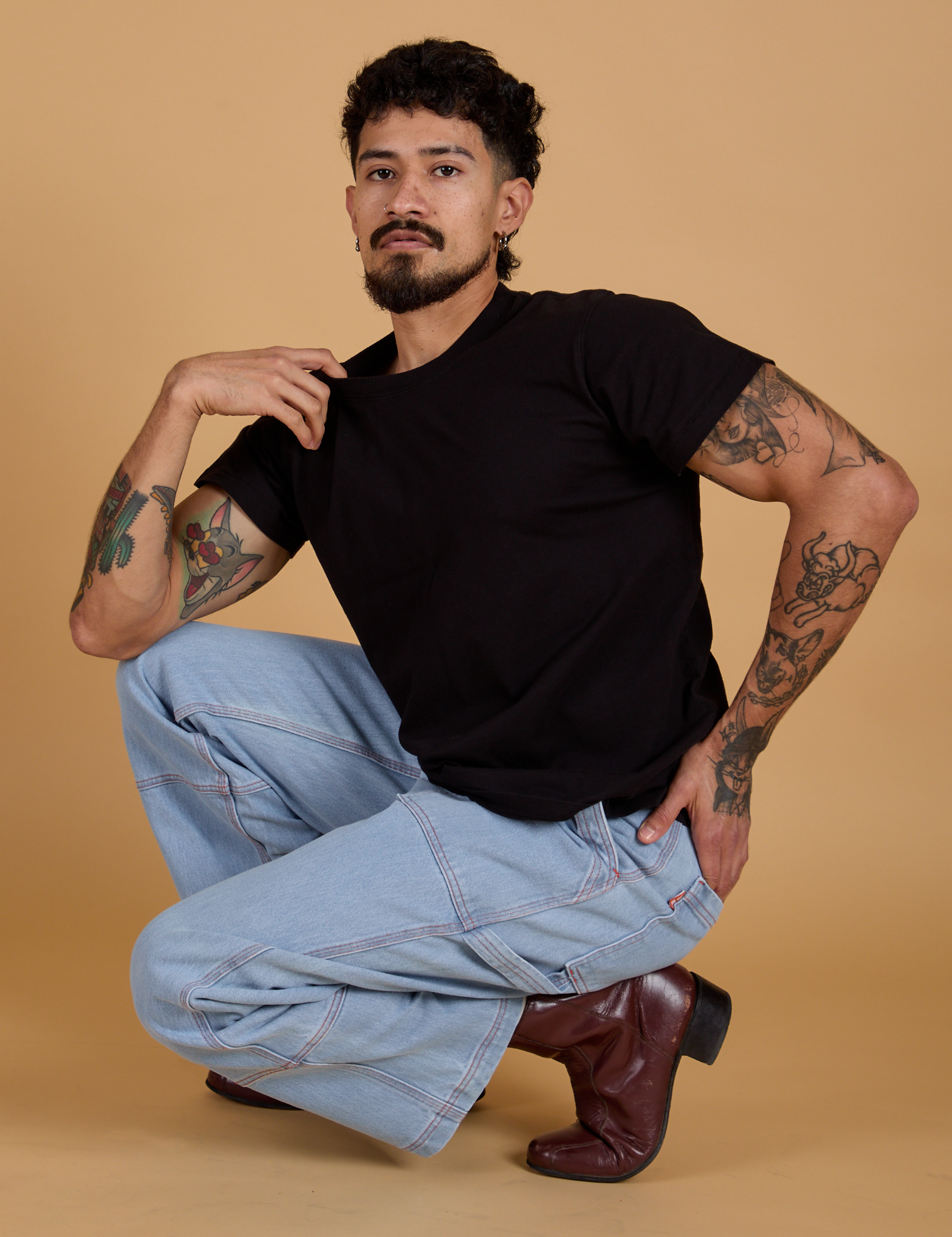 Organic Vintage Tee in Basic Black and light wash Carpenter Jeans on Jesse