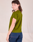 Organic Vintage Tee in Summer Olive angled back view on Alex