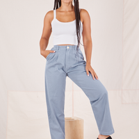 Gabi is 5'7" and wearing XXS Organic Trousers in Periwinkle paired with vintage off-white Cropped Cami