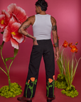 Back view of Paintstamped Work Pants in Poppy and Cropped Tank in Vintage Tee White on Jesse