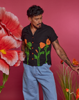 Paintstamped Pantry Button-Up in Poppy worn by Jesse
