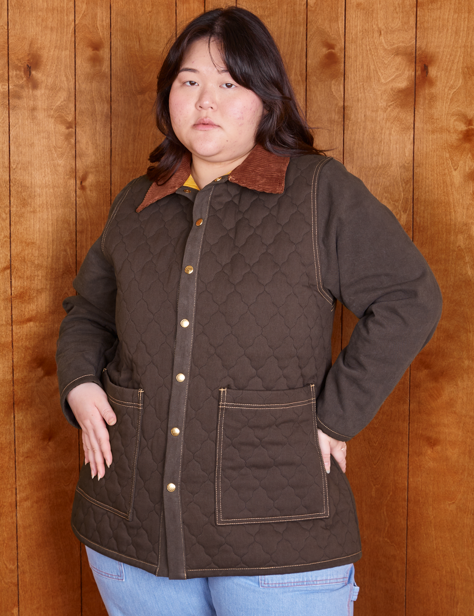 Ashley is 5&#39;7&quot; and wearing M Quilted Overcoat in Espresso Brown