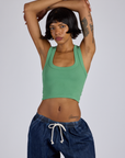 Kira is 5’10” and wearing P  Tank Top in Seafoam Green