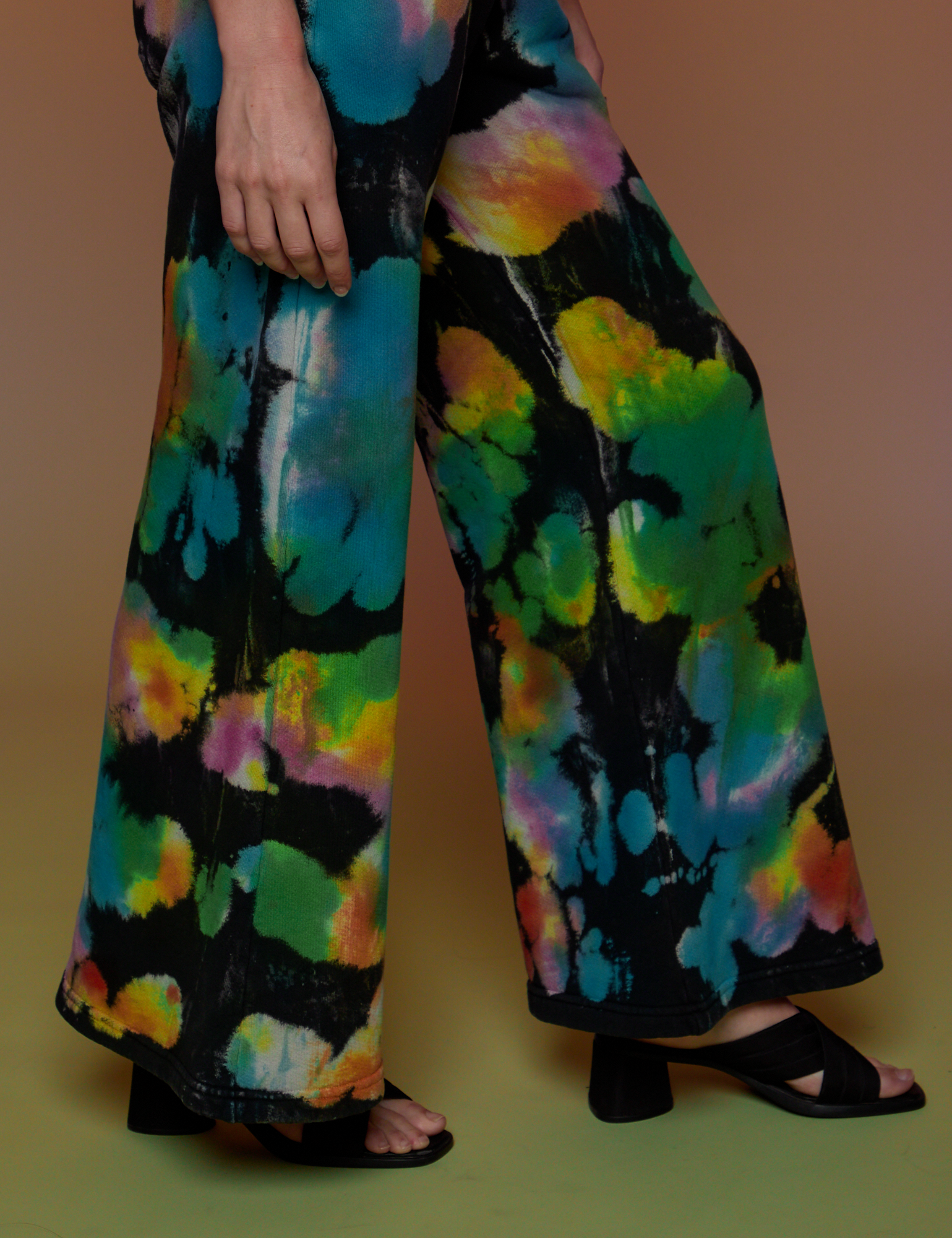 Pant leg side view close up of Tie Dyed Wide Leg Sweat Pants on Alex