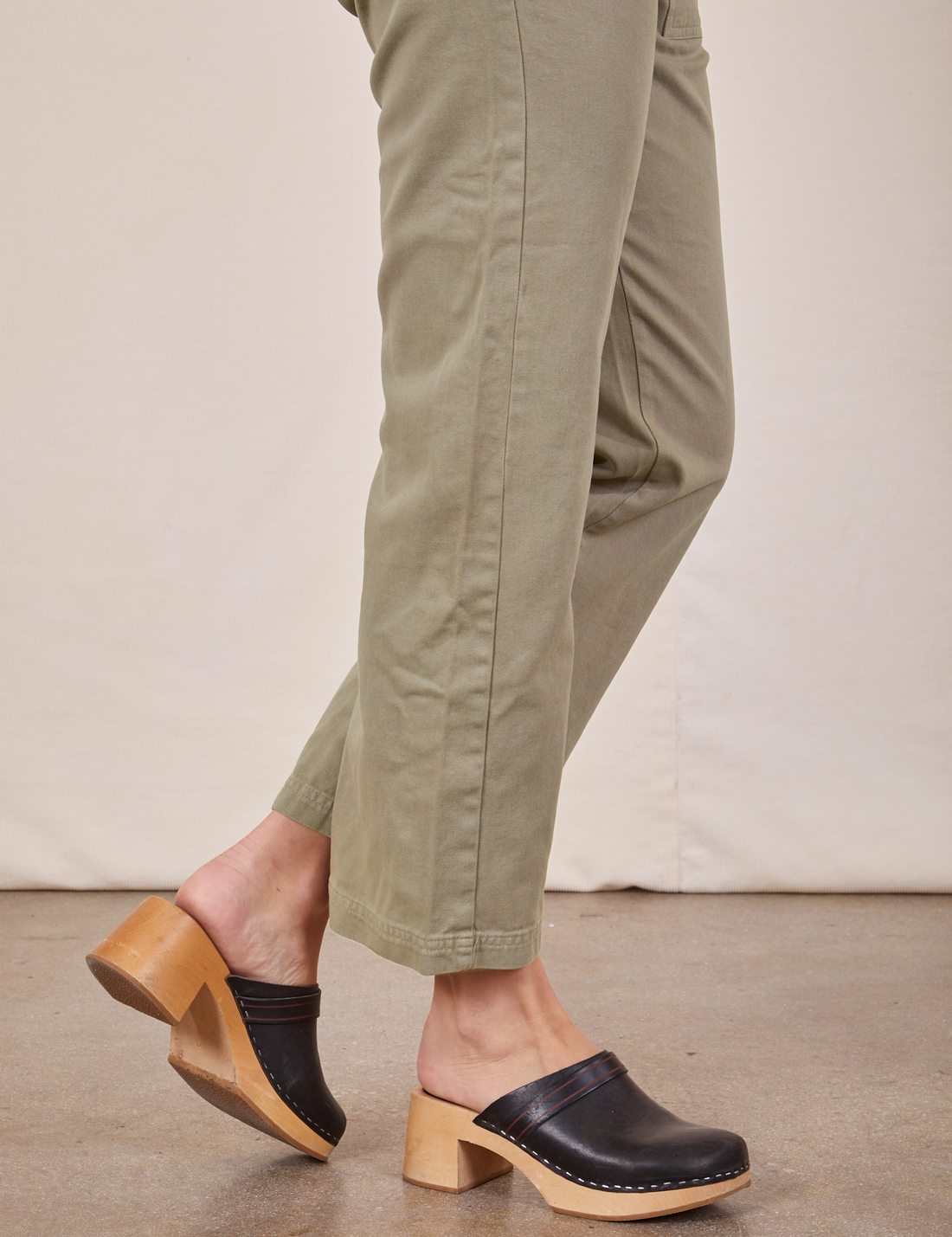 Side pant leg close up of Short Sleeve Jumpsuit in Khaki Grey worn by Alex