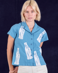 Soda Bottle Pantry Button-Up in Greek Blue worn by Madeline