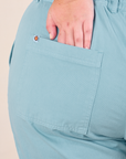 Short Sleeve Jumpsuit in Baby Blue back pocket close up on Juliet