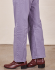 Side view pant leg close up of Short Sleeve Jumpsuit in Faded Grape worn by Jesse