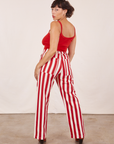 Back view of Work Pants in Cherry Stripe and mustang red Cropped Cami on Tiara