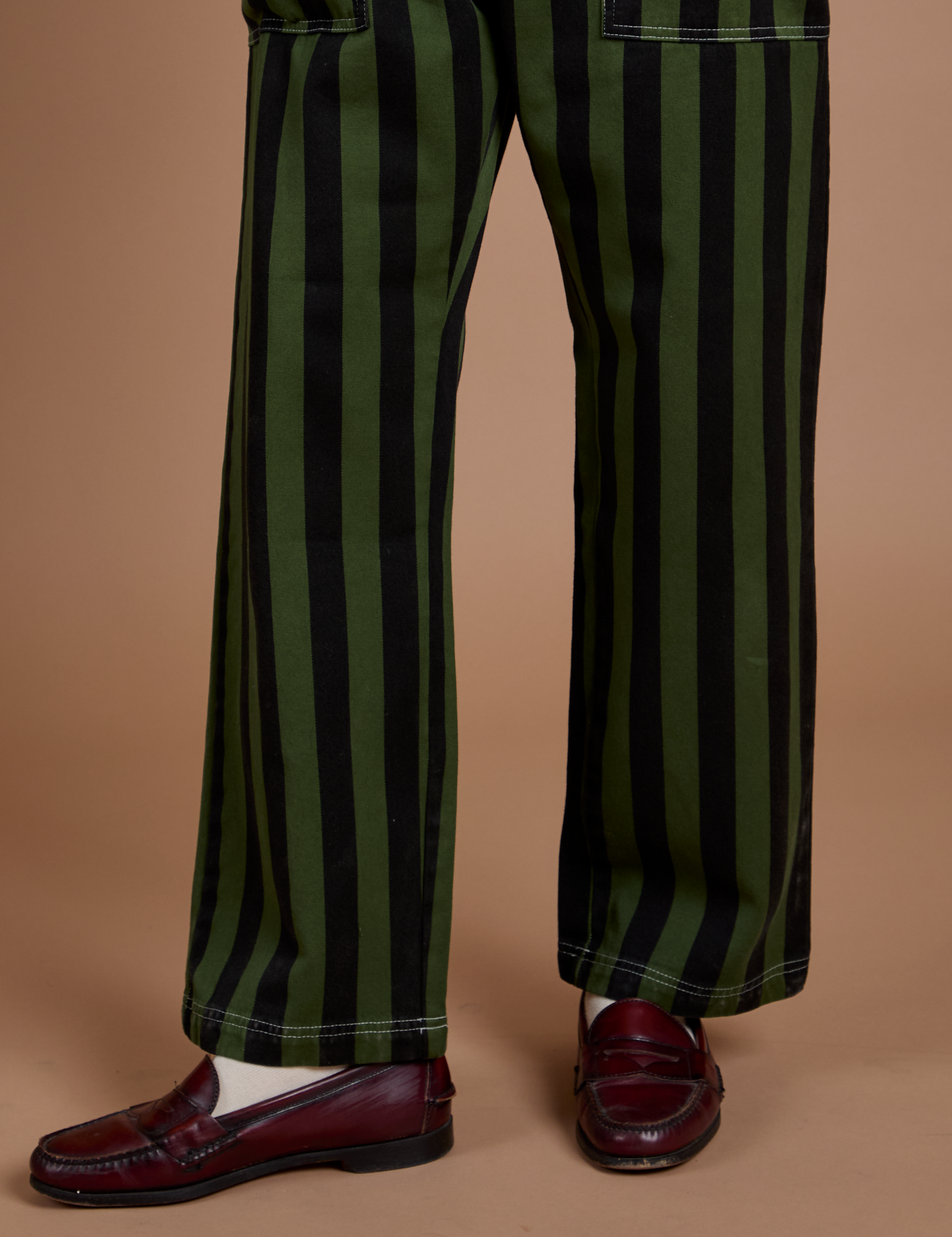 Black Stripe Work Pants in Evergreen pant leg close up on Anthony