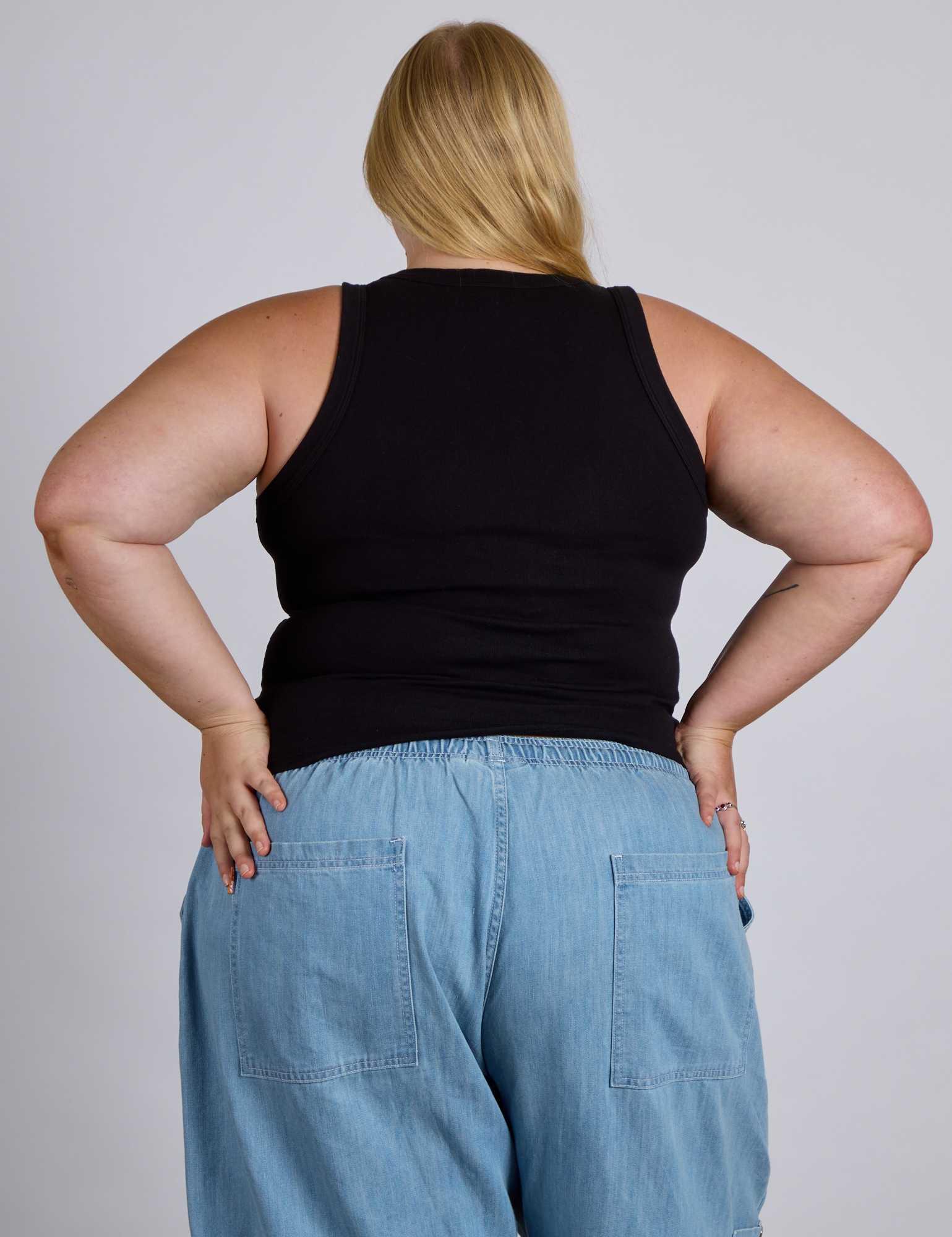 Back view of The Tank Top in Basic Black on Juliet