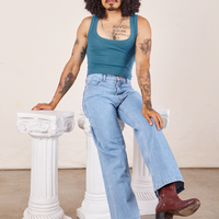 Jesse is wearing Cropped Tank Top in Marine Blue and light wash Sailor Jeans