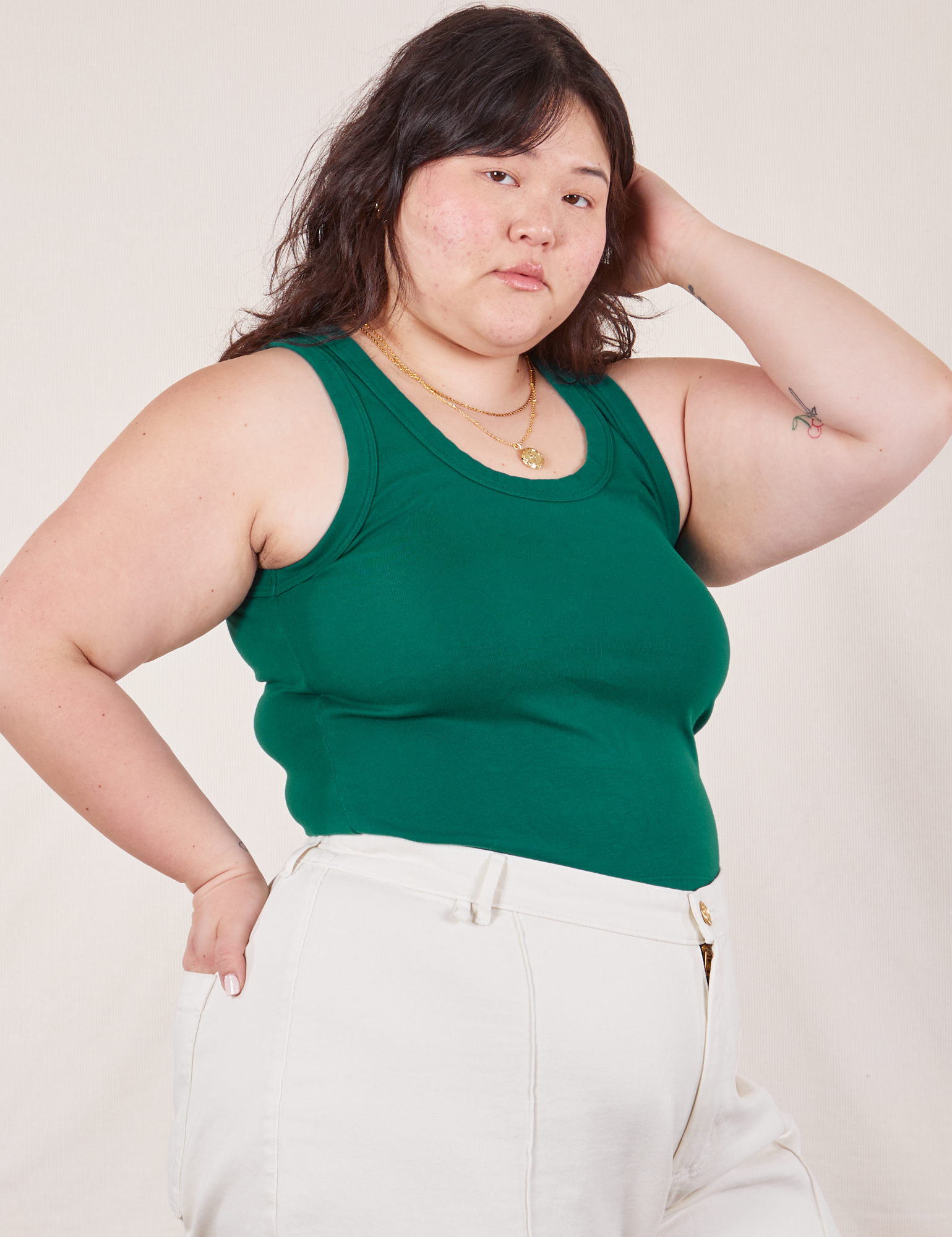 Angled front view of Tank Top in Hunter Green on Ashley