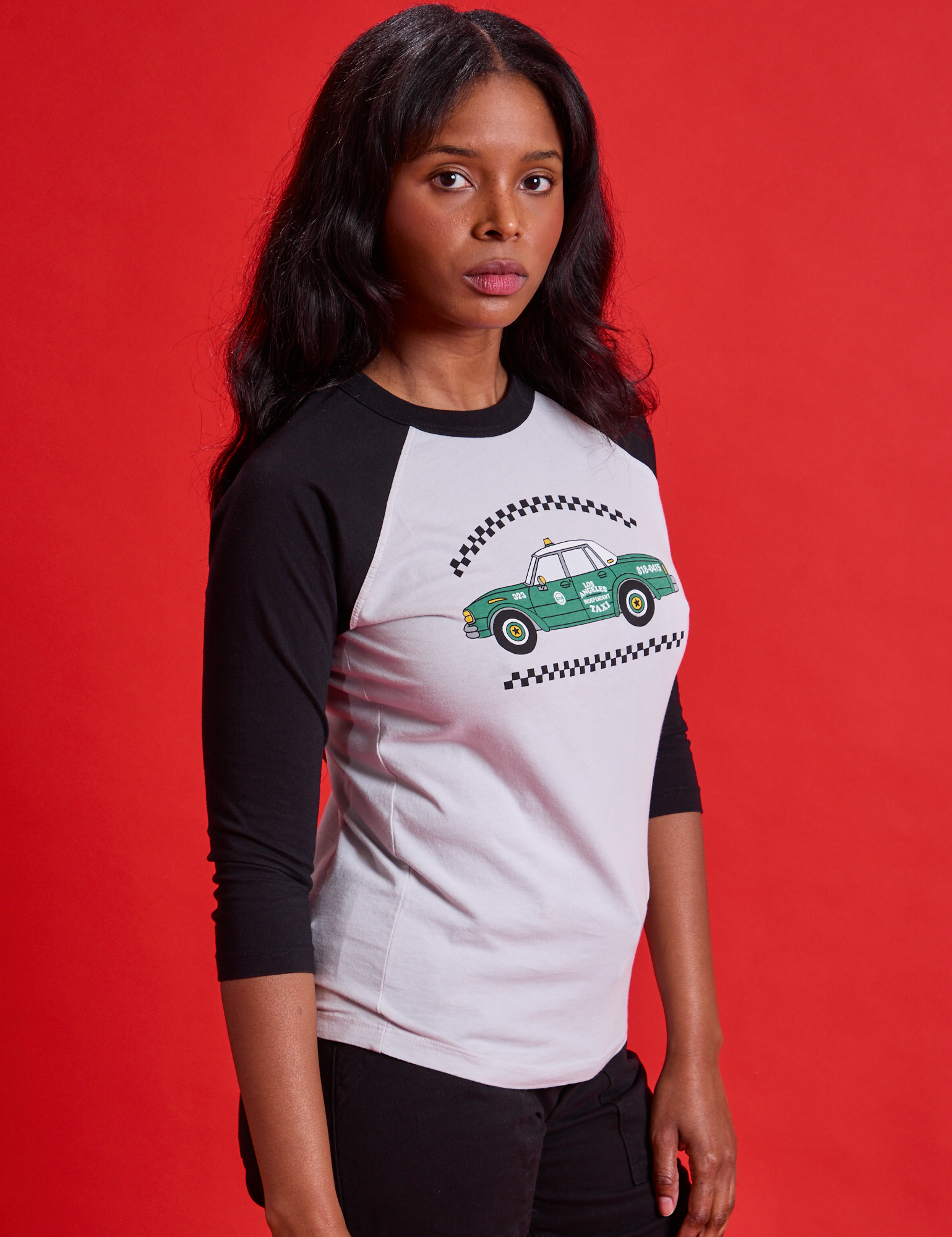 Taxi Raglan Tee in Los Angeles angled front view on Kandia