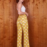 Angled back view of Western Pants in Yellow Jacquard worn by Alex
