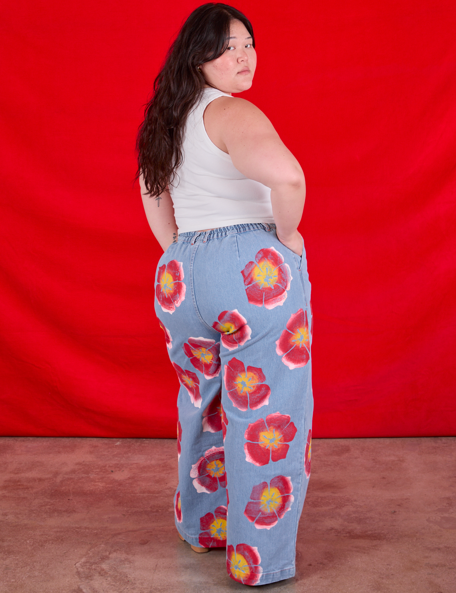 Wide Leg Denim Trousers in Painted Flowers back view on Ashley