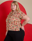 Angled front view of Hot Stuff Print Pantry Button-Up on Juliet