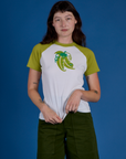 Alex is 5’8” and wearing P Produce Raglan Tee in Snap Peas