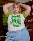 Juliet is wearing Short Sleeve Raglan Tee in Snap Peas