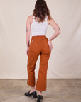 Back view of Western Pants in Burnt Terracotta and Cropped Tank in Vintage Tee Off-White on Alex