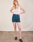 Margaret is 5'11" and wearing XS Western Shorts in Lagoon paired with Cropped Tank in vintage tee off-white
