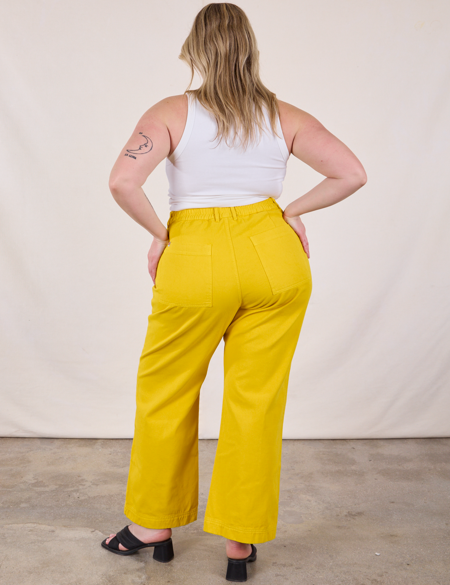 Back view of Western Pants in Golden Yellow on Lish