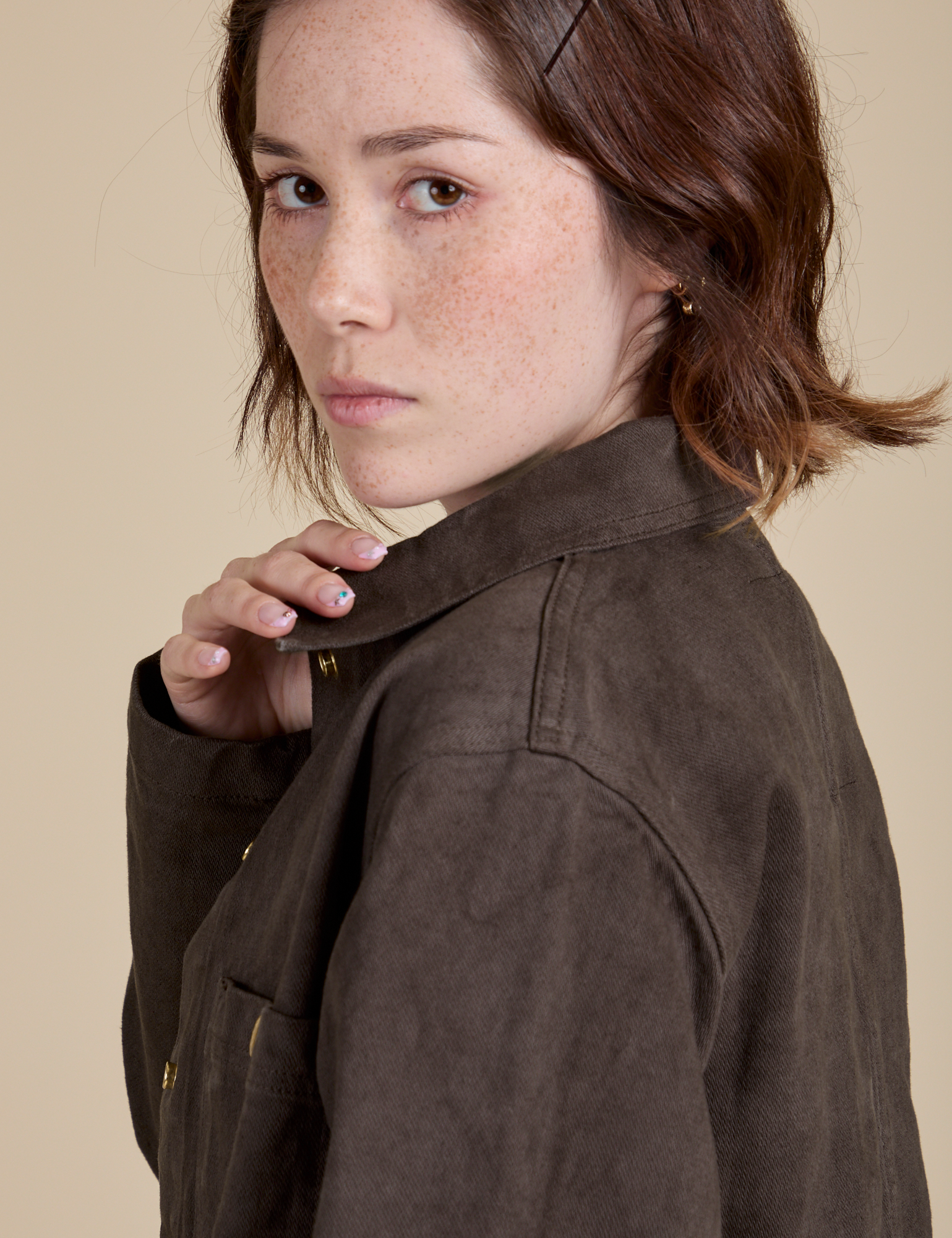 Denim Work Jacket in Espresso Brown shoulder close up on Hana