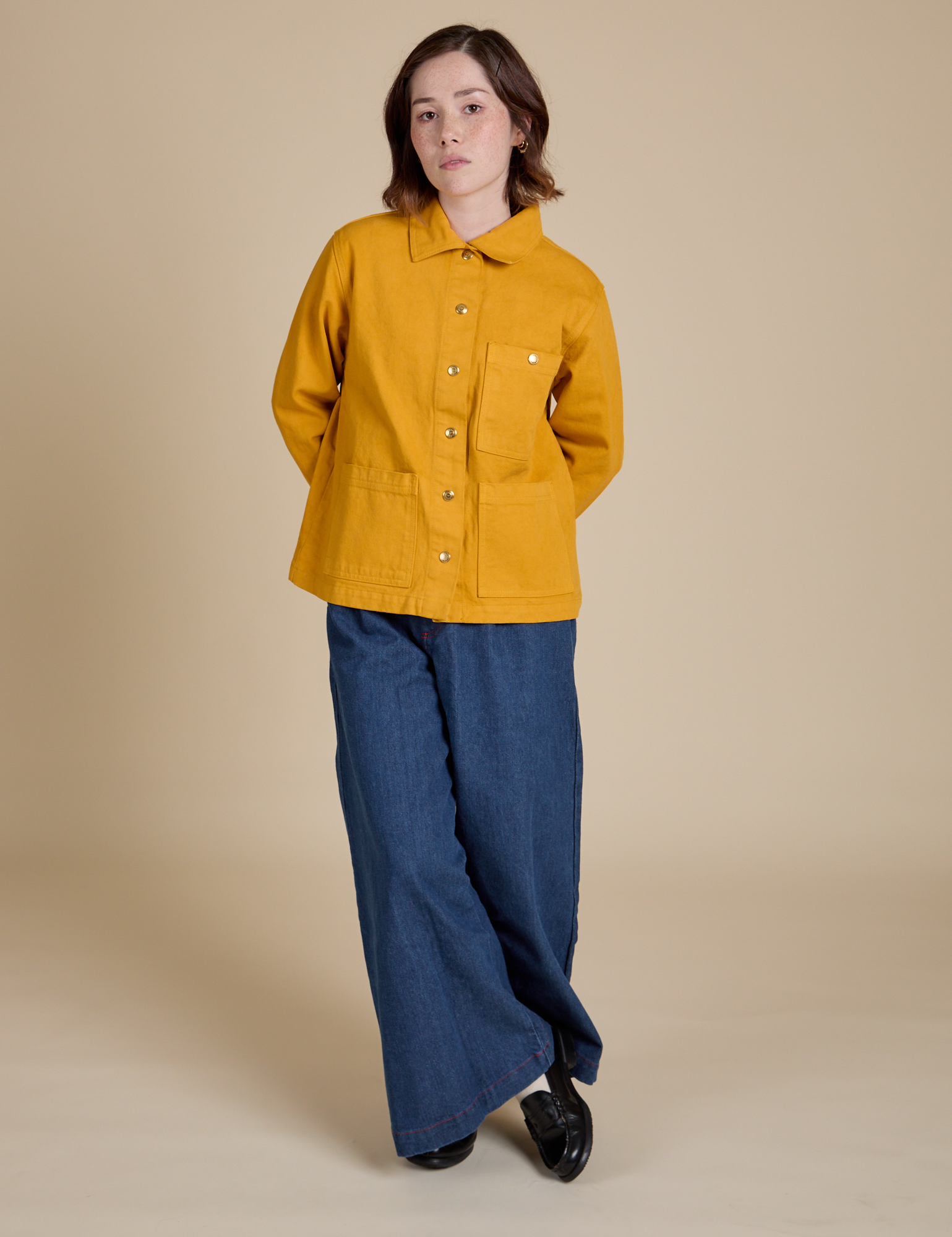 Denim Work Jacket in Mustard Yellow and dark wash Indigo Wide Leg Trousers worn by Hana