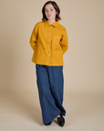 Denim Work Jacket in Mustard Yellow and dark wash Indigo Wide Leg Trousers worn by Hana