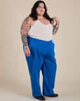 Angled front view of Work Pants in Royal Blue and Tank Top in Vintage Off-Tee White on Sam