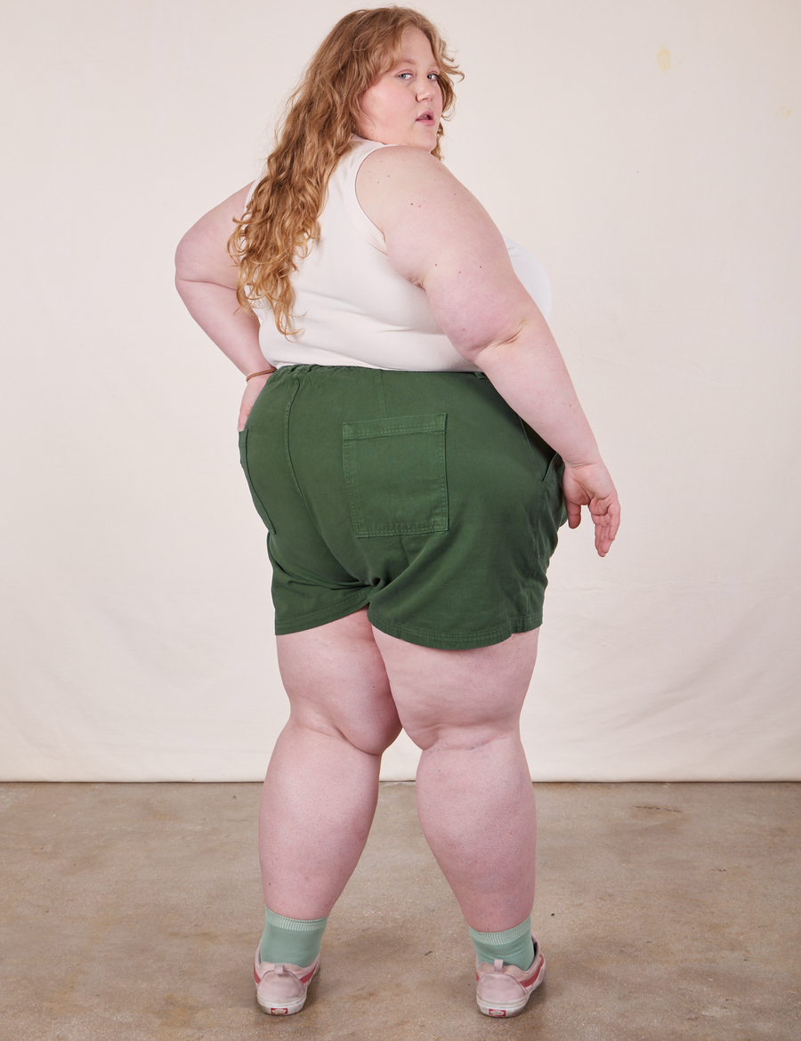Back view of Classic Work Shorts in Dark Emerald Green on Catie