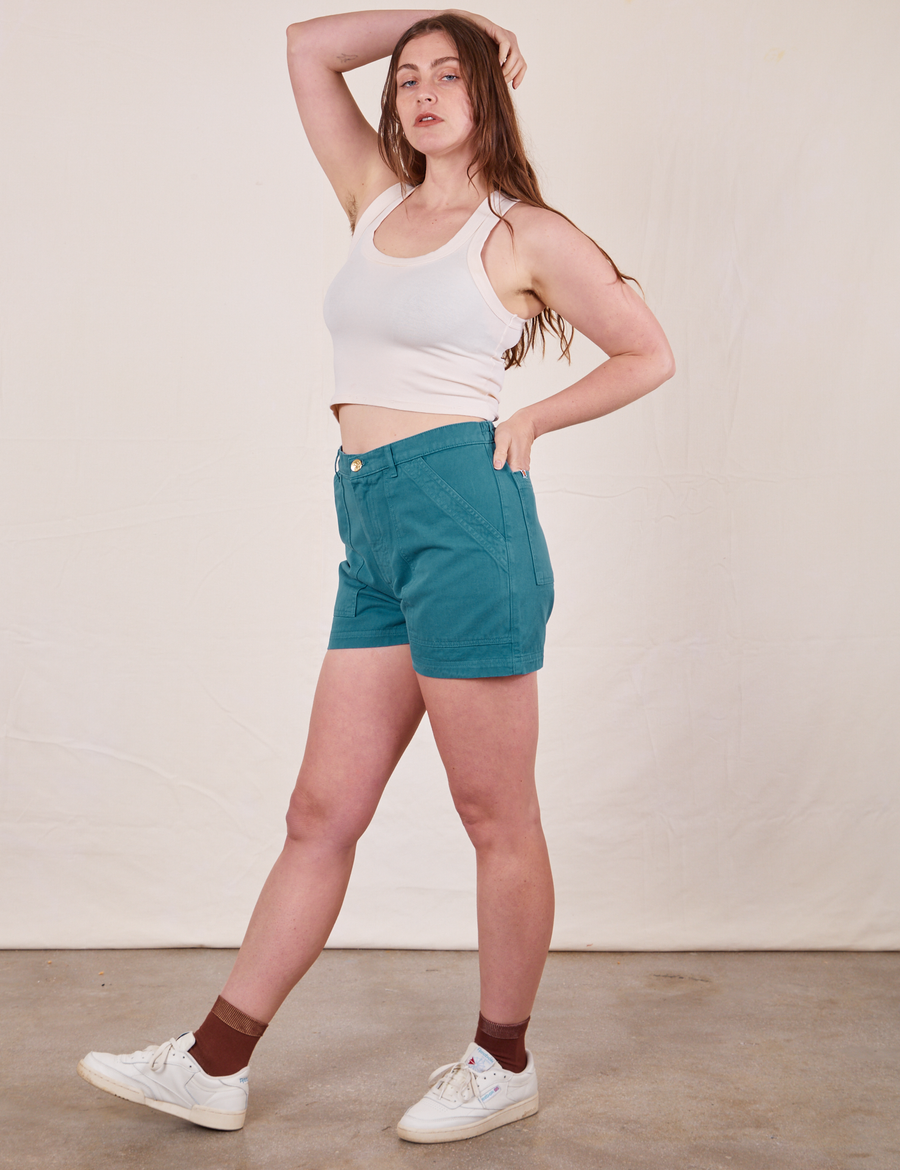Side view of Classic Work Shorts in Marine Blue and vintage off-white Tank Top worn by Allison