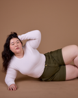Classic Work Shorts in Surplus Green and vintage tee white Long Sleeve Baby Tee worn by Ashley