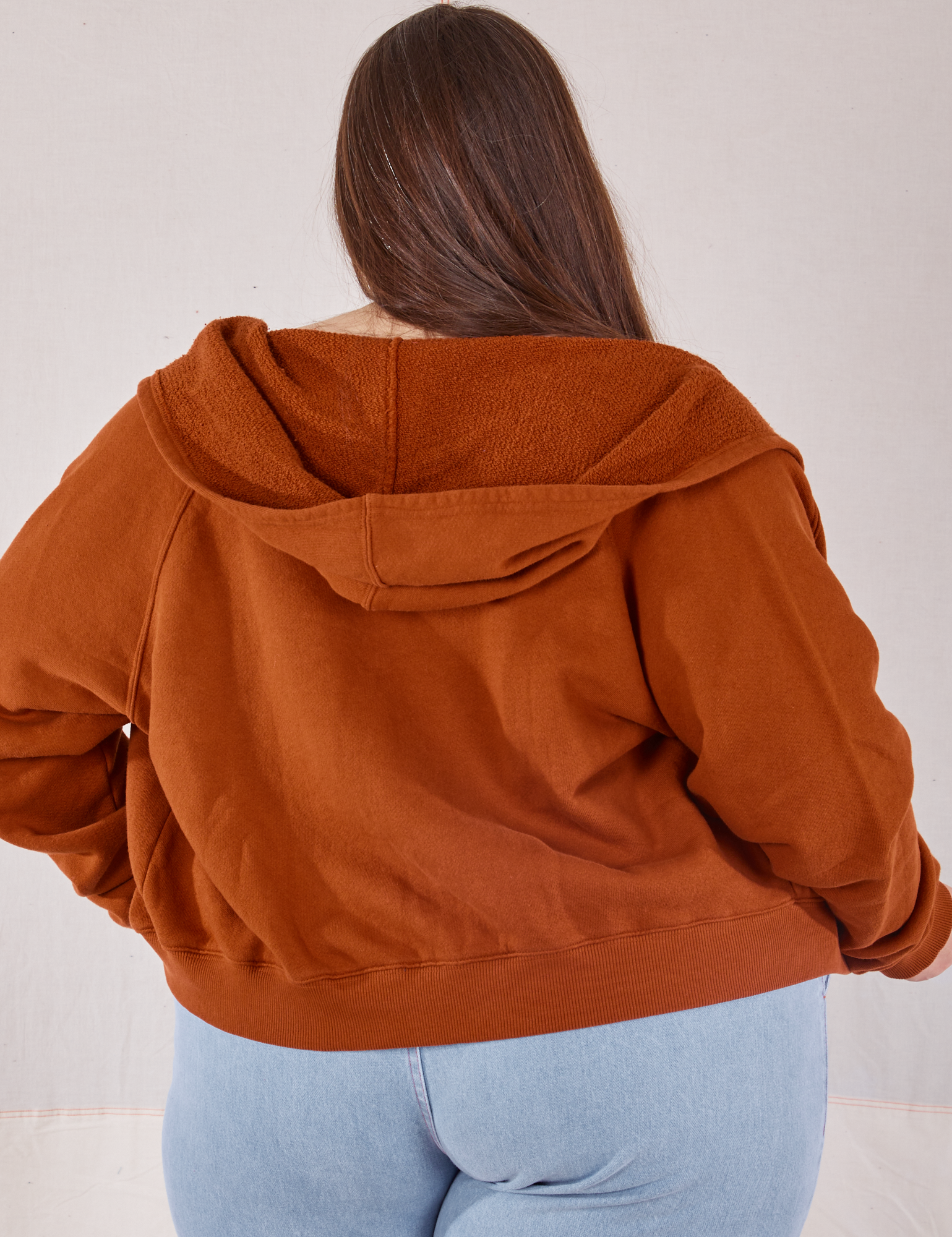 Cropped Zip Hoodie in Burnt Terracotta back view on Marielena