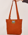 Over-Shoulder Zip Mini Tote in Burnt Terracotta held by model