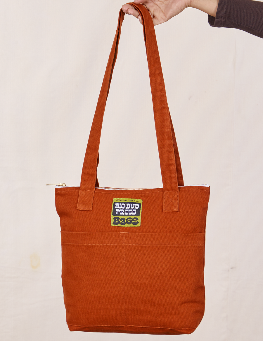 Over-Shoulder Zip Mini Tote in Burnt Terracotta held by model