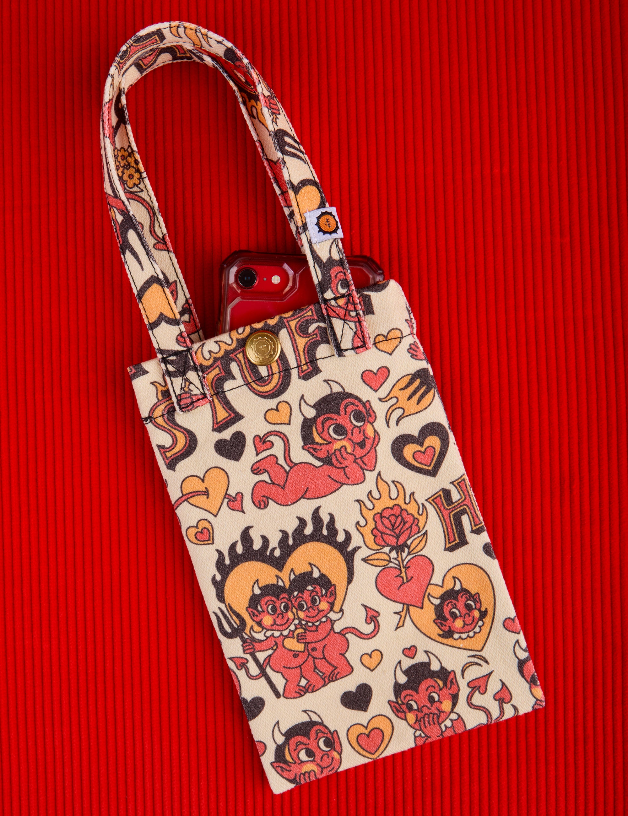 Hot Stuff Printed Cell Phone Tote with phone inside