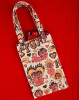 Hot Stuff Printed Cell Phone Tote with phone inside