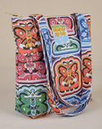 Angled view of Butterfly Kaleidoscope Shoulder Zip Tote