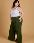 Heritage Wide Leg Trousers in Evergreen side view on Ashley
